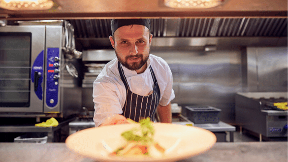 Chef shows the meal he has created